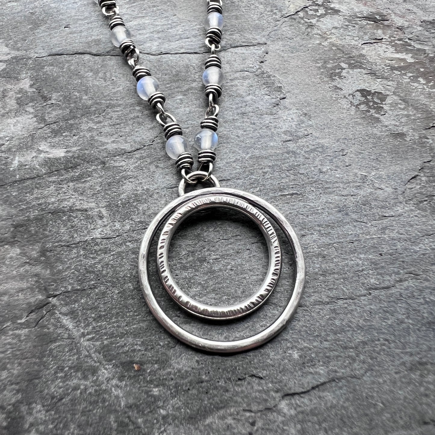 Rainbow Moonstone Sterling Silver Necklace | Wire-wrapped White Stones with Hammered Silver Rings Pendant