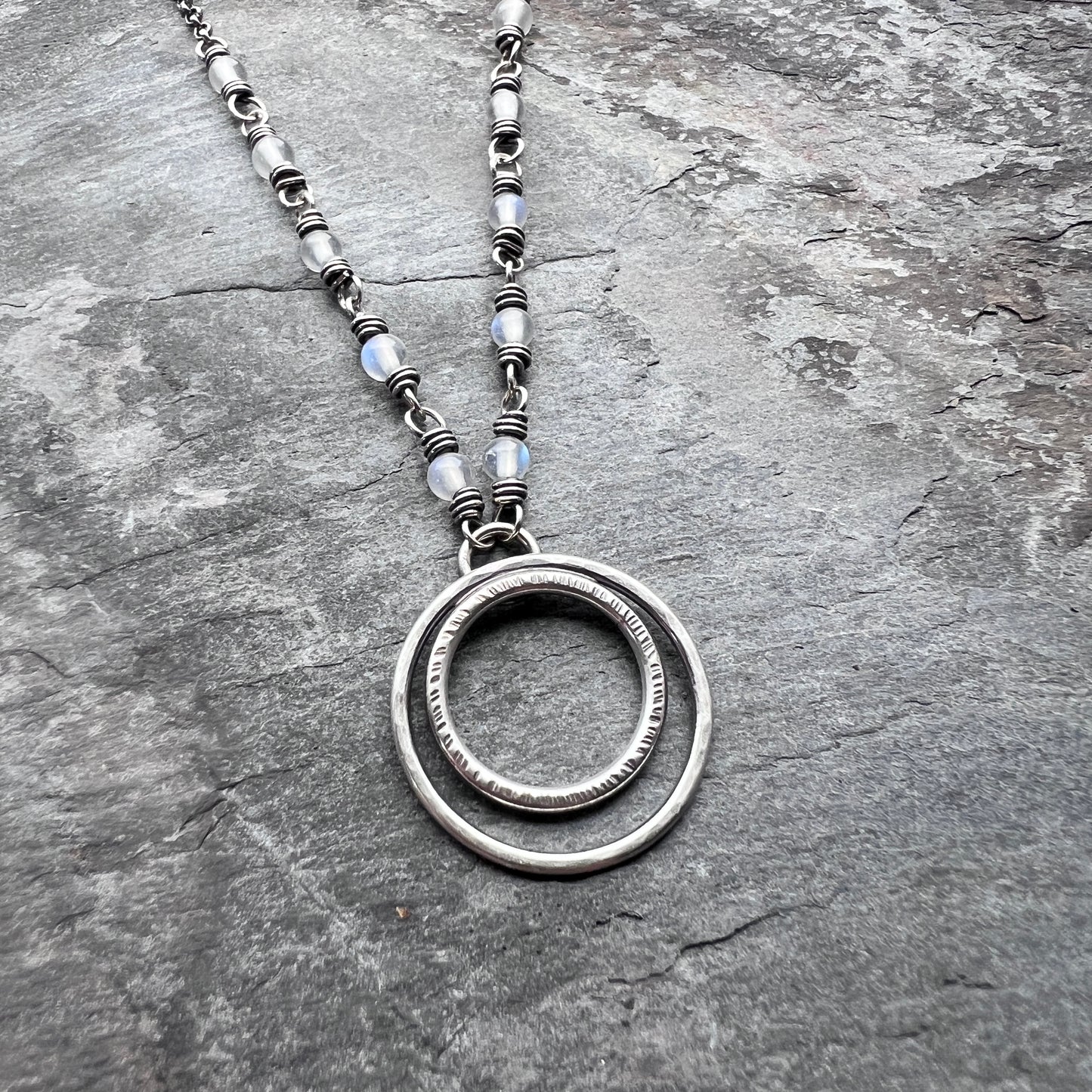 Rainbow Moonstone Sterling Silver Necklace | Wire-wrapped White Stones with Hammered Silver Rings Pendant