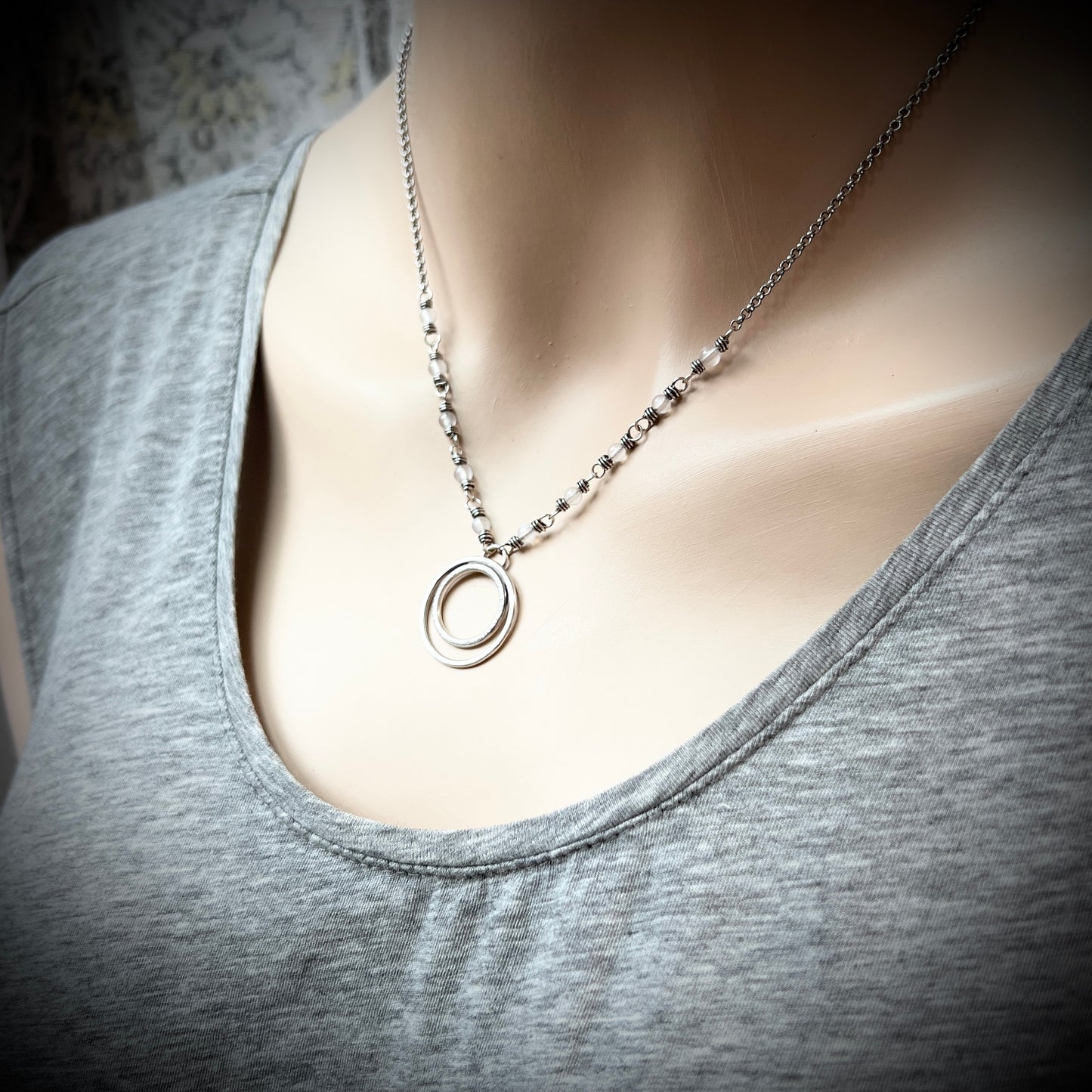 Rainbow Moonstone Sterling Silver Necklace | Wire-wrapped White Stones with Hammered Silver Rings Pendant
