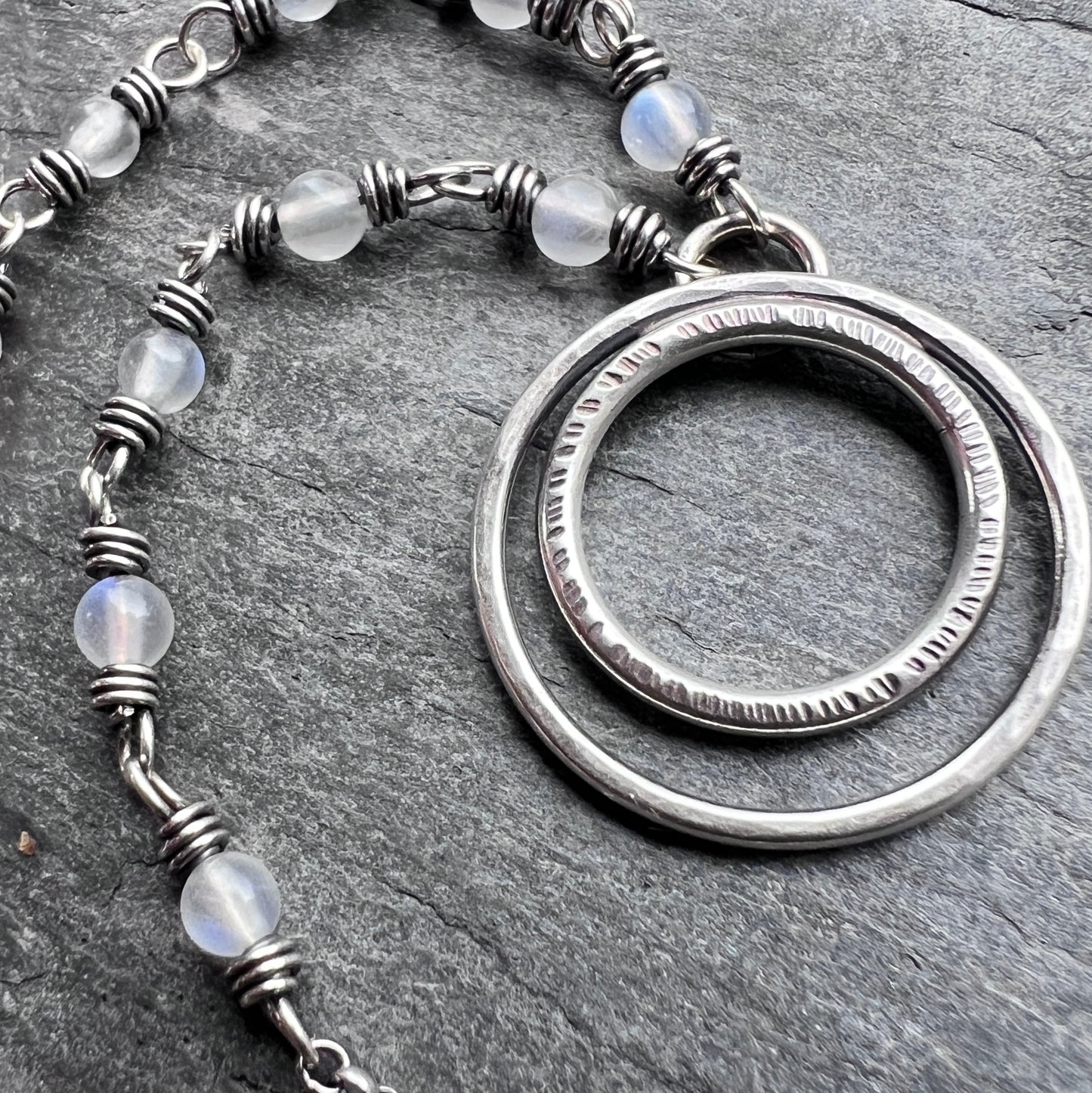 Rainbow Moonstone Sterling Silver Necklace | Wire-wrapped White Stones with Hammered Silver Rings Pendant